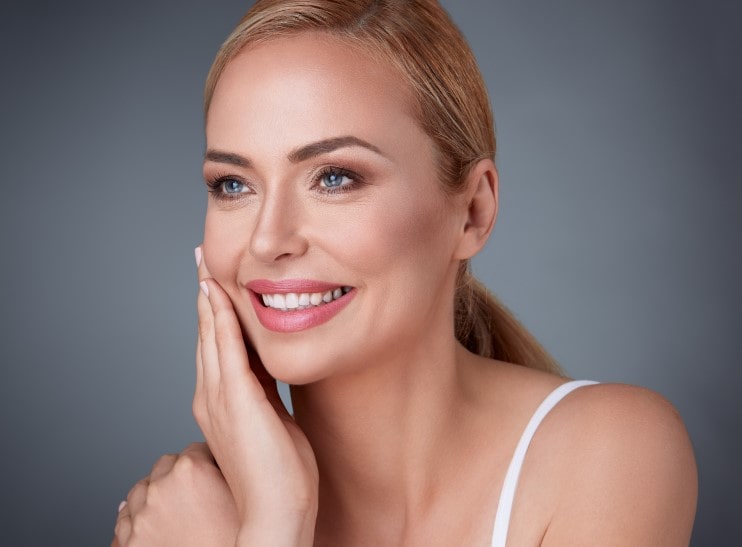 smiling woman with neck lift