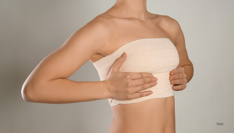 Women with bandage over her breast